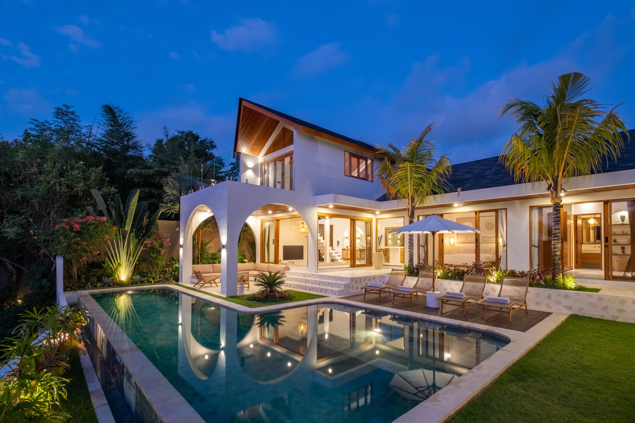 Villa Vayu at night with pool lighting