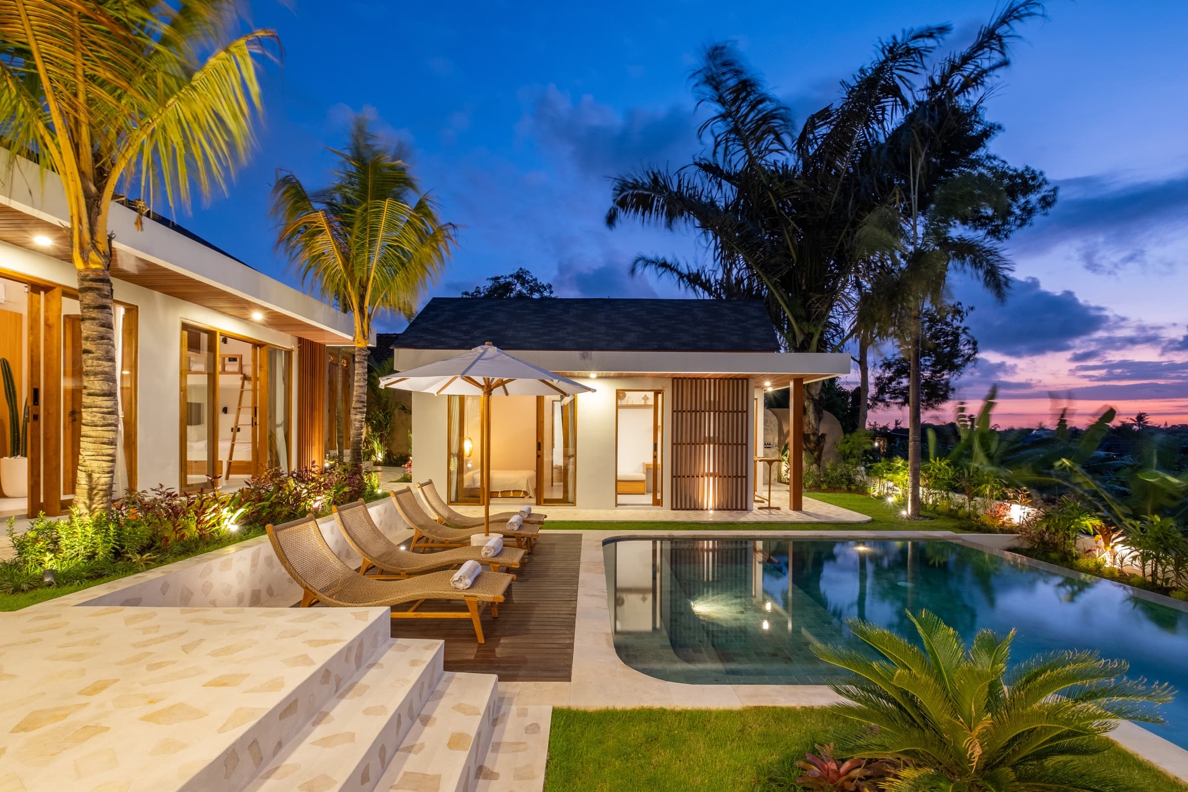 Soft lighting around the pool at Villa Vayu