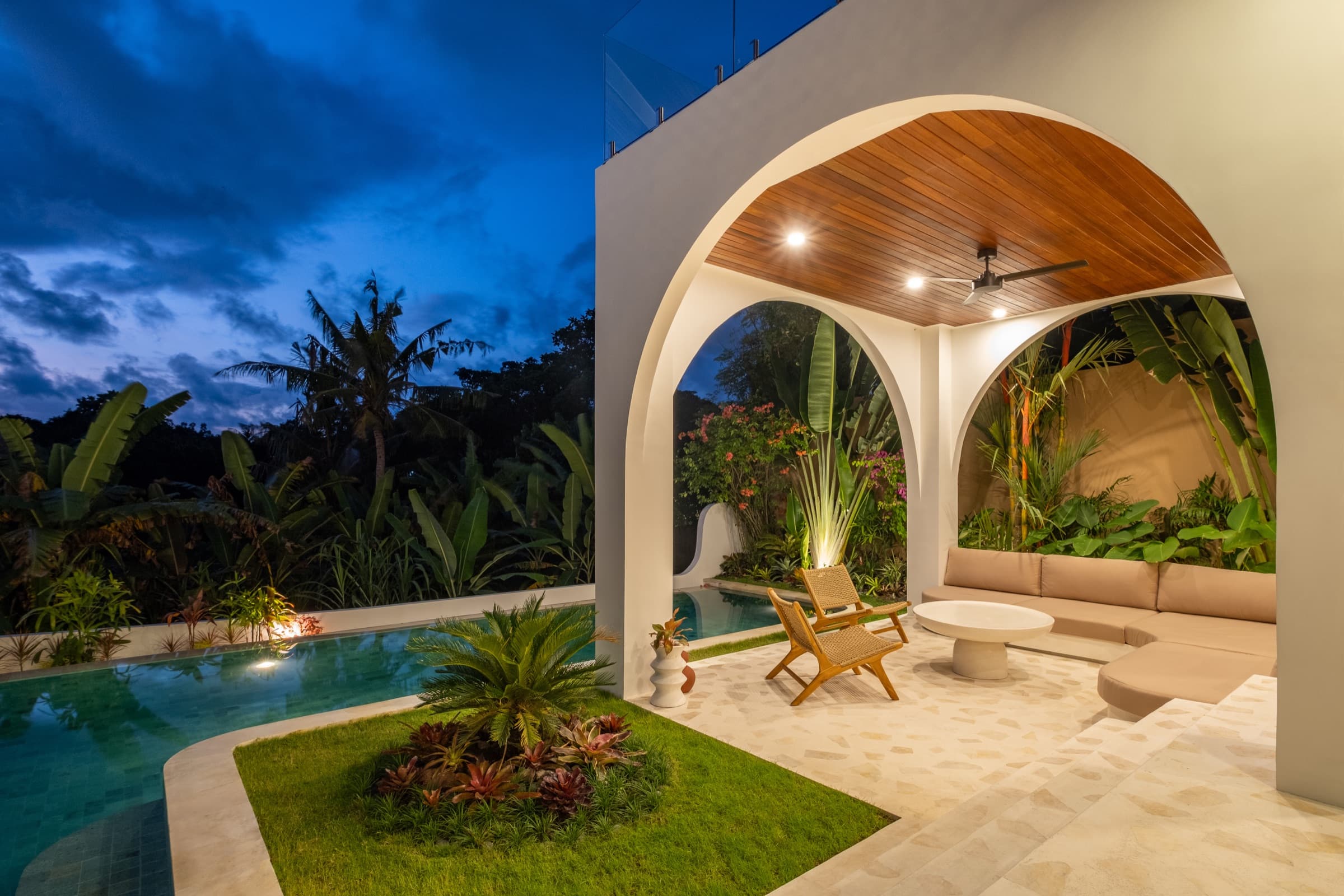 Atmospheric evening setting by the pool at Villa Vayu