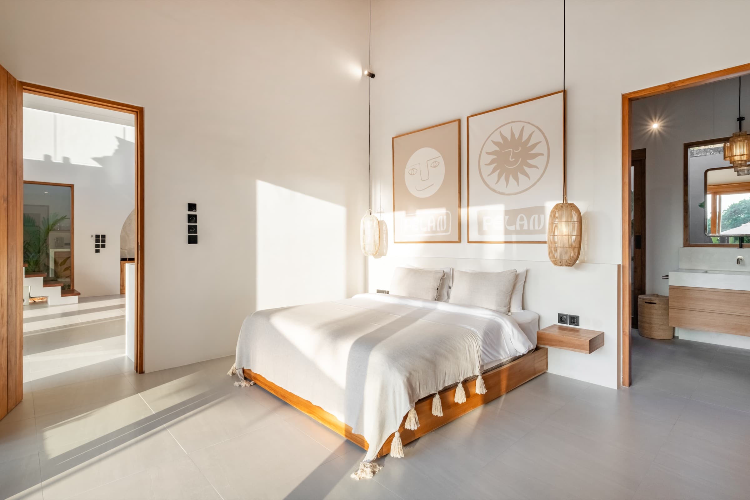 Master bedroom with seating area at Villa Vayu